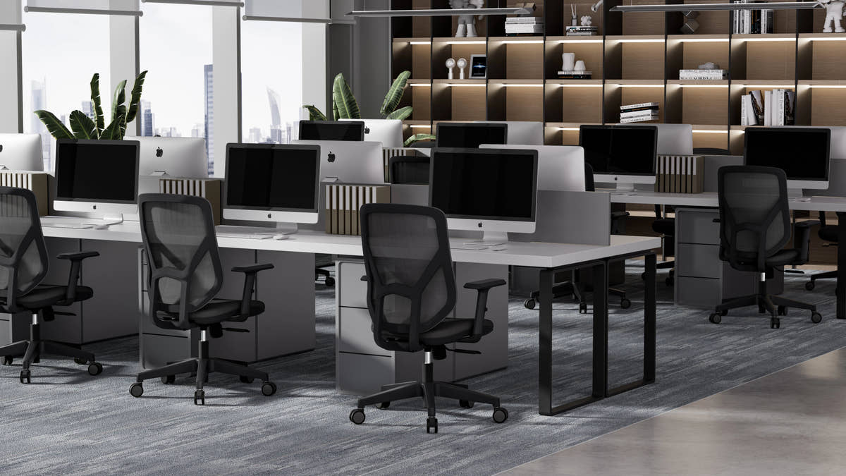 A19 black desk chair in open plan corporate office workspace setting