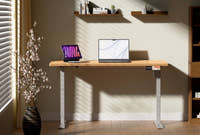 Shappa MS1 electric standing desk with timber tabletop and white frame in a cosy home office setting