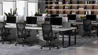 A19 black desk chair in open plan corporate office workspace setting