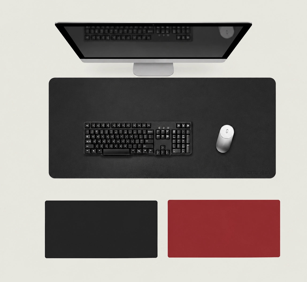 Shappa Dual-Sided Desk Mat in black, shown with a keyboard and mouse plus the black and red colour options