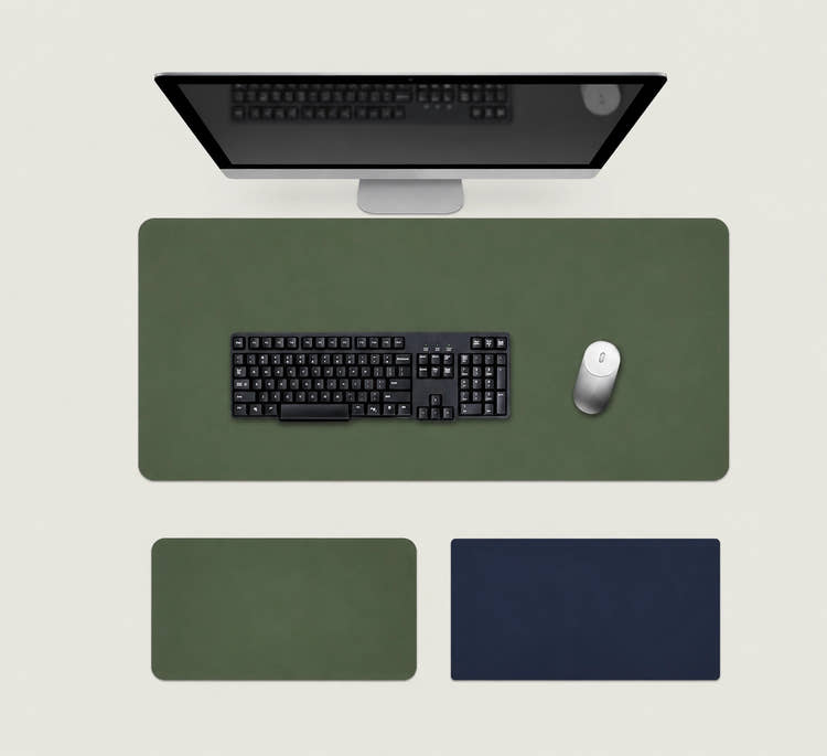 Shappa Dual-Sided Desk Mat in green, shown with a keyboard and mouse plus the green and navy colour options
