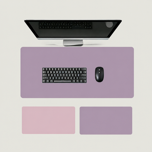 Shappa Dual-Sided Desk Mat in purple, shown with a keyboard and mouse plus the pink and purple colour options