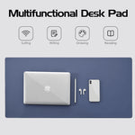 Navy leather desk mat with icons showing its use for surfing, writing, drawing and reading
