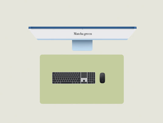 Matcha Green keypad mat with a keyboard and mouse placed on top