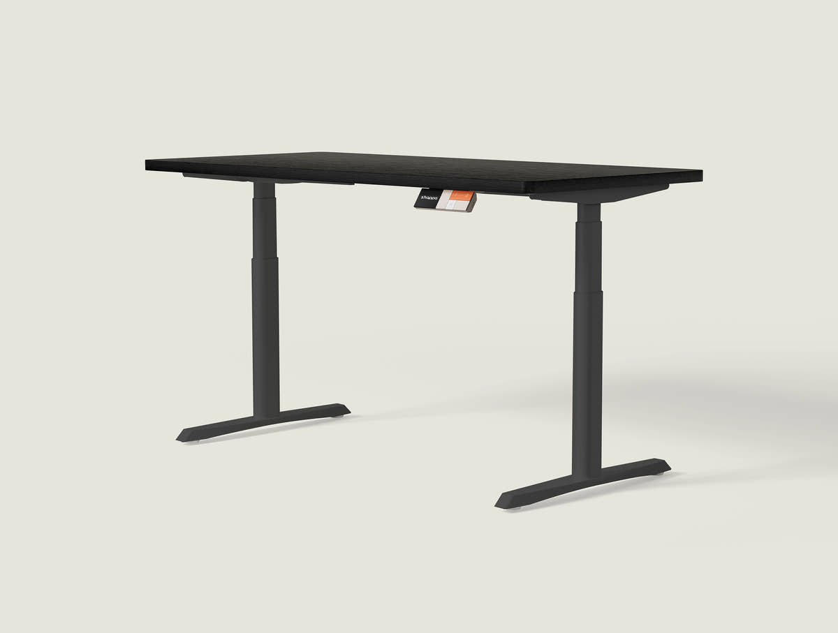 Shappa MO2 electric standing desk with black tabletop and black frame - dual motor oval tube angled studio shot