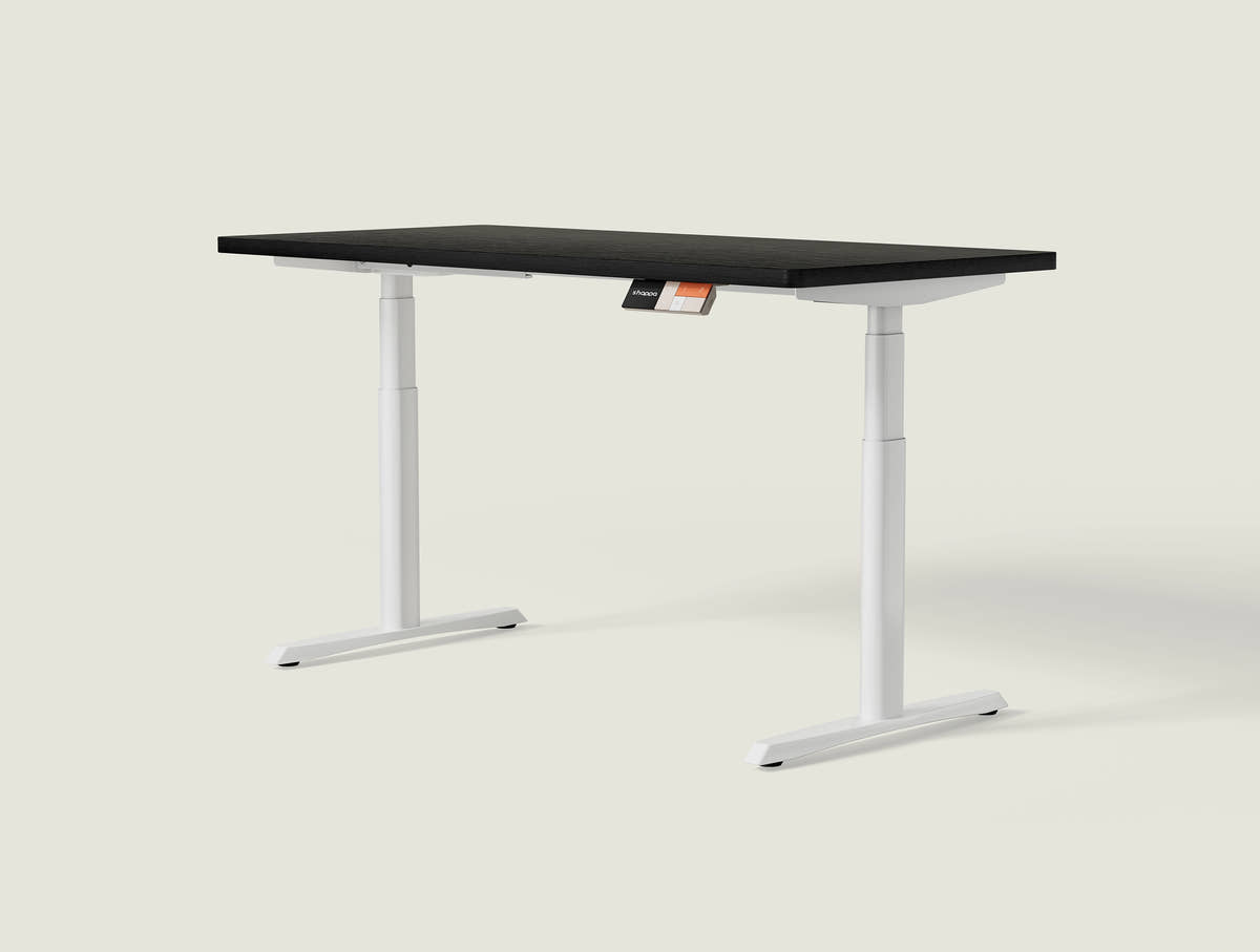 Shappa MO2 electric standing desk with black tabletop and white frame - dual motor oval tube angled studio shot