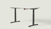 Shappa MO2 electric standing desk with white tabletop and black frame - dual motor oval tube angled studio shot