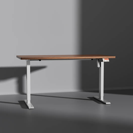 Shappa MS1 electric standing desk with walnut tabletop and white frame - front angle studio shot