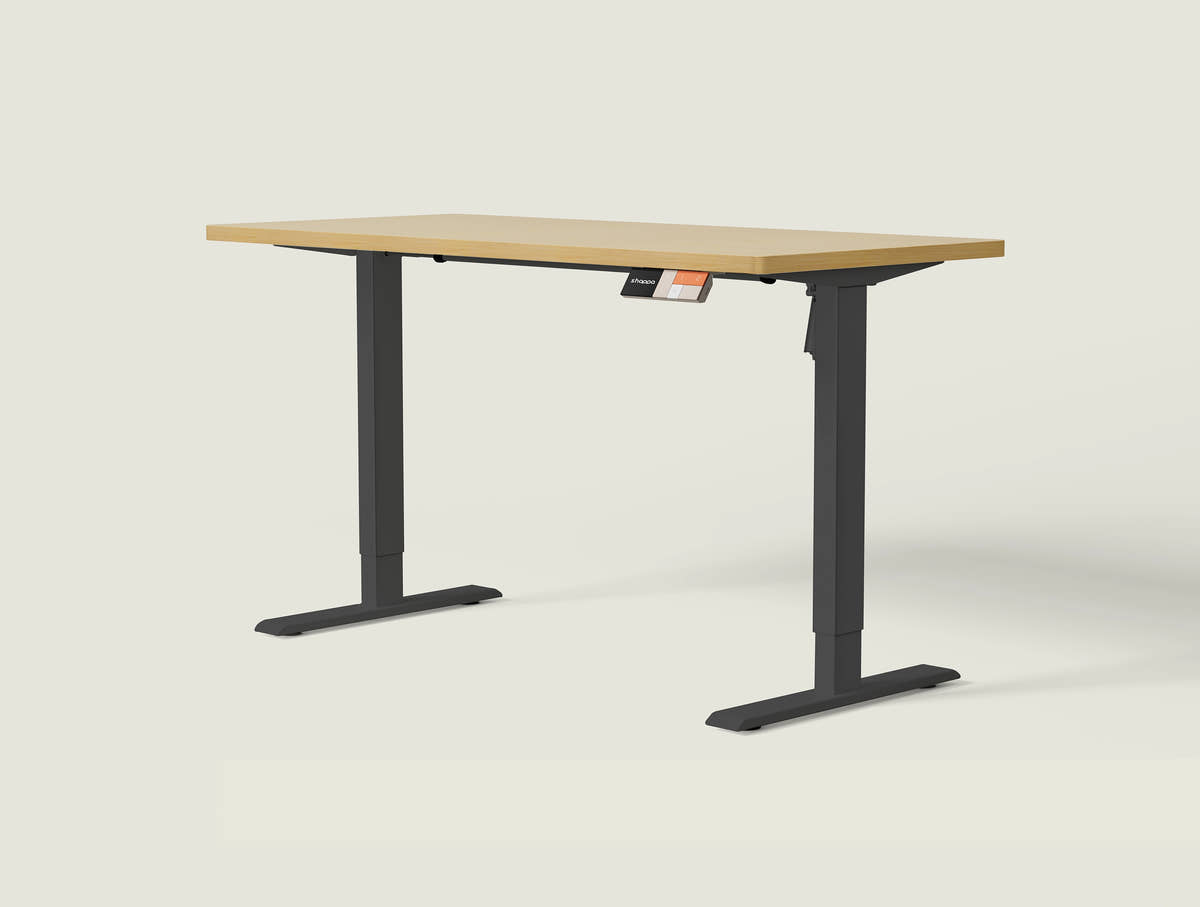 Shappa MS1 electric standing desk with light walnut tabletop and black frame - single motor angled studio shot