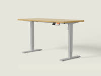 Shappa MS1 electric standing desk with light walnut tabletop and grey frame - single motor angled studio shot