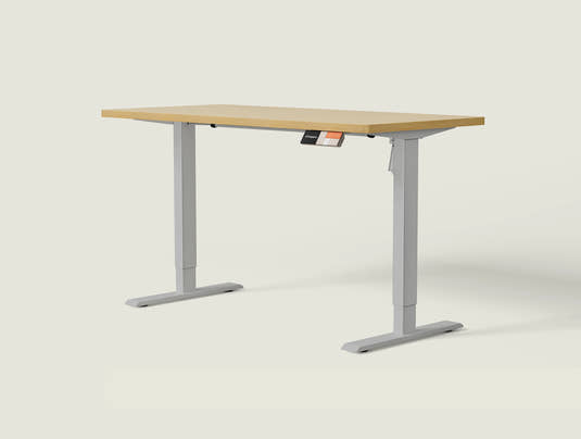 Shappa MS1 electric standing desk with light walnut tabletop and grey frame - single motor angled studio shot
