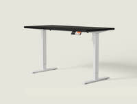 Shappa MS1 electric standing desk with black tabletop and white frame - single motor angled studio shot