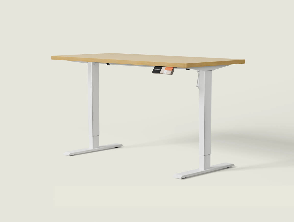 Shappa MS1 electric standing desk with light walnut tabletop and white frame - single motor angled studio shot