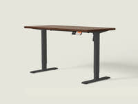 Shappa MS1 electric standing desk with walnut tabletop and black frame - single motor angled studio shot