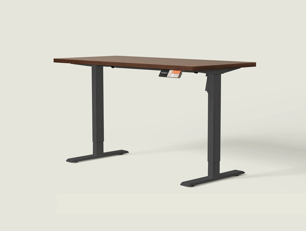 Shappa MS1 electric standing desk with walnut tabletop and black frame - single motor angled studio shot