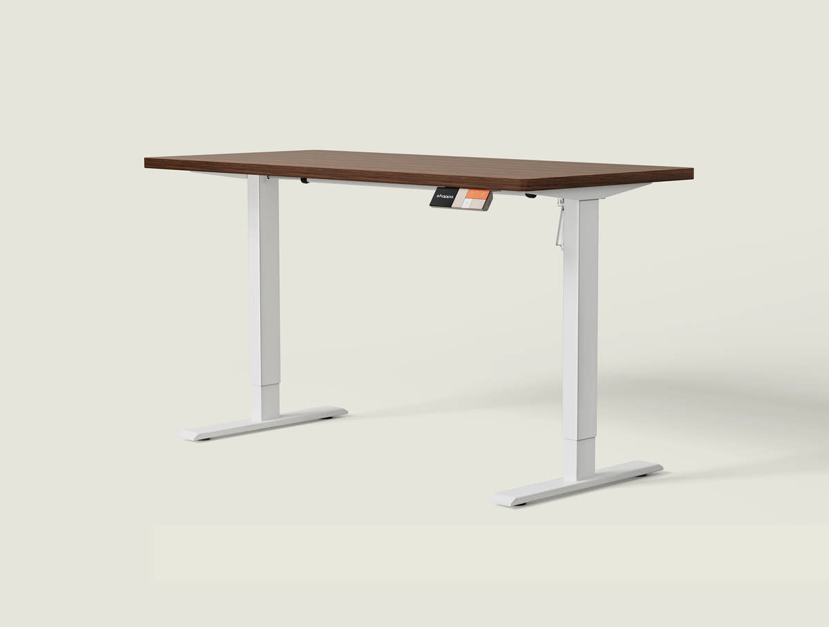 Shappa MS1 electric standing desk with walnut tabletop and white frame - single motor angled studio shot