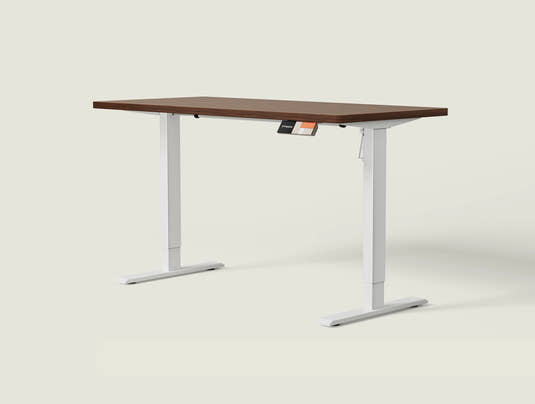 Shappa MS1 electric standing desk with walnut tabletop and white frame - single motor angled studio shot