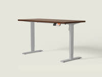 Shappa MS1 electric standing desk with walnut tabletop and grey frame - single motor angled studio shot