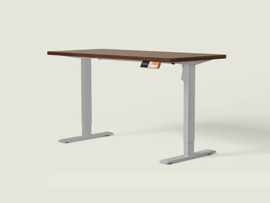 Shappa MS1 electric standing desk with walnut tabletop and grey frame - single motor angled studio shot