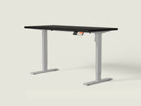 Shappa MS1 electric standing desk with black tabletop and grey frame - single motor angled studio shot