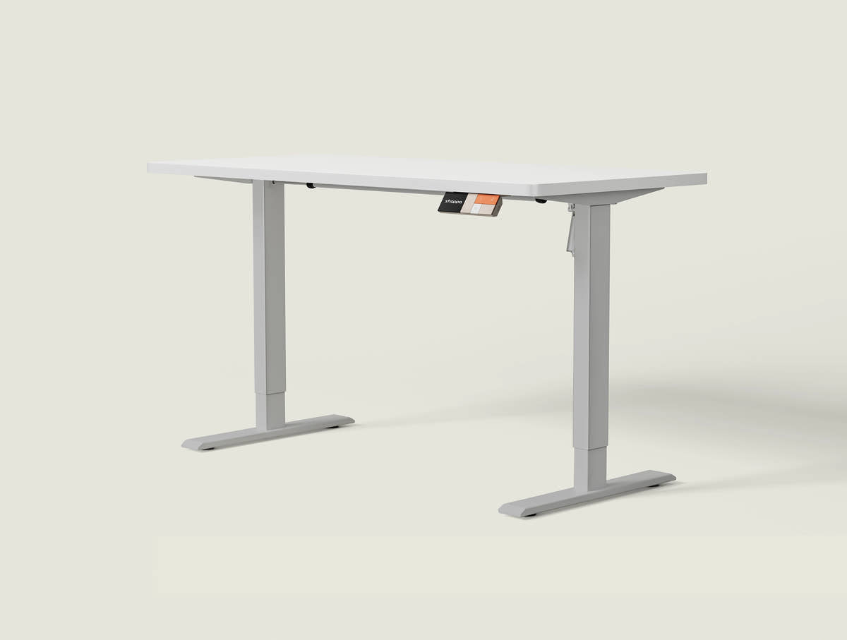 Shappa MS1 electric standing desk with white tabletop and grey frame - single motor angled studio shot