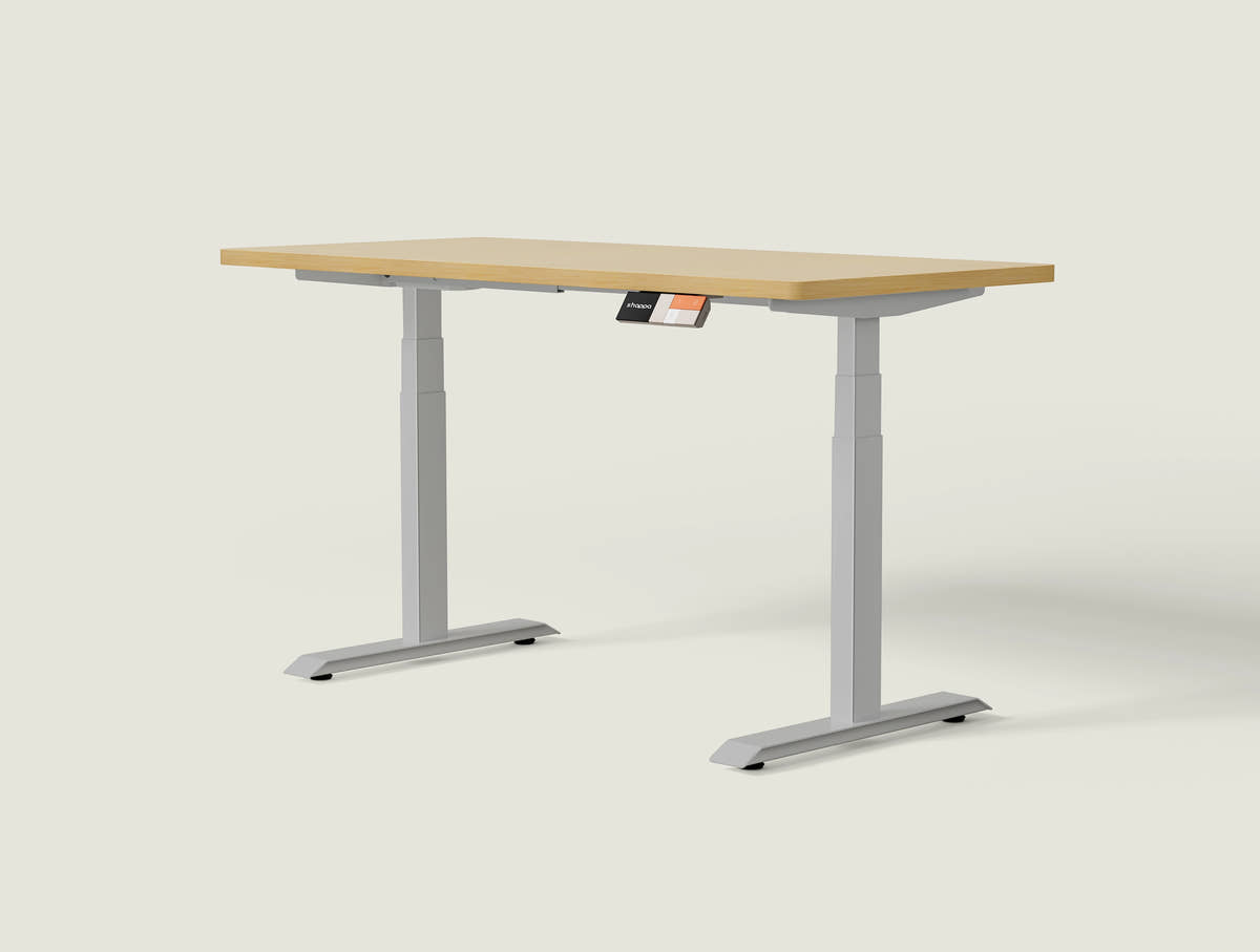 Shappa MS2 electric standing desk with light walnut tabletop and grey frame - dual motor square tube angled studio shot