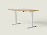 Shappa MS2 electric standing desk with light walnut tabletop and white frame - dual motor square tube angled studio shot