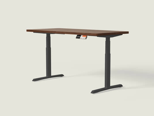 Shappa MS2 electric standing desk with walnut tabletop and black frame - dual motor square tube angled studio shot