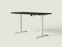 Shappa MS2 electric standing desk with black tabletop and white frame - dual motor square tube angled studio shot