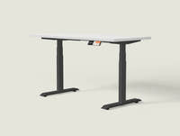 Shappa MS2 electric standing desk with white tabletop and black frame - dual motor square tube angled studio shot