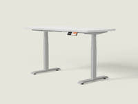 Shappa MS2 electric standing desk with white tabletop and grey frame - dual motor square tube angled studio shot