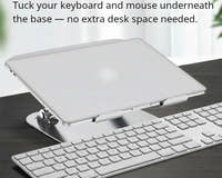 Shappa Laptop Stand Riser with keyboard and mouse tucked underneath the base on a desk
