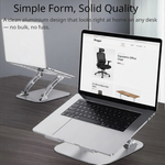  Shappa Laptop Stand Riser holding a MacBook on a wood desk, with a second stand and laptop in the background