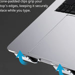 Shappa Laptop Stand Riser silicone-padded clips gripping the edge of a laptop to prevent slipping