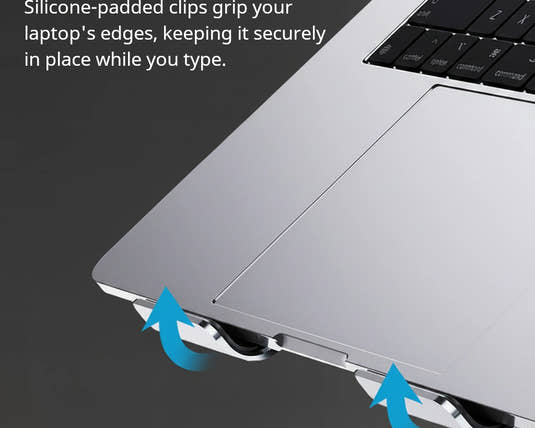 Shappa Laptop Stand Riser silicone-padded clips gripping the edge of a laptop to prevent slipping