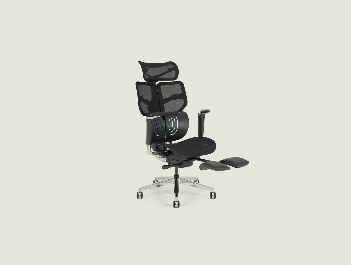Shappa Spencer black ergonomic office chair reclined with extended leg rest, angle view