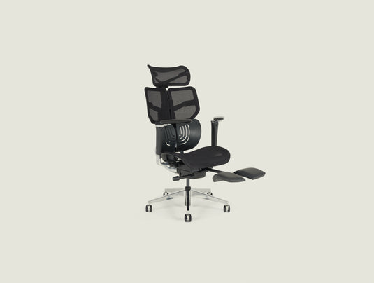 Shappa Spencer black ergonomic office chair reclined with extended leg rest, angle view