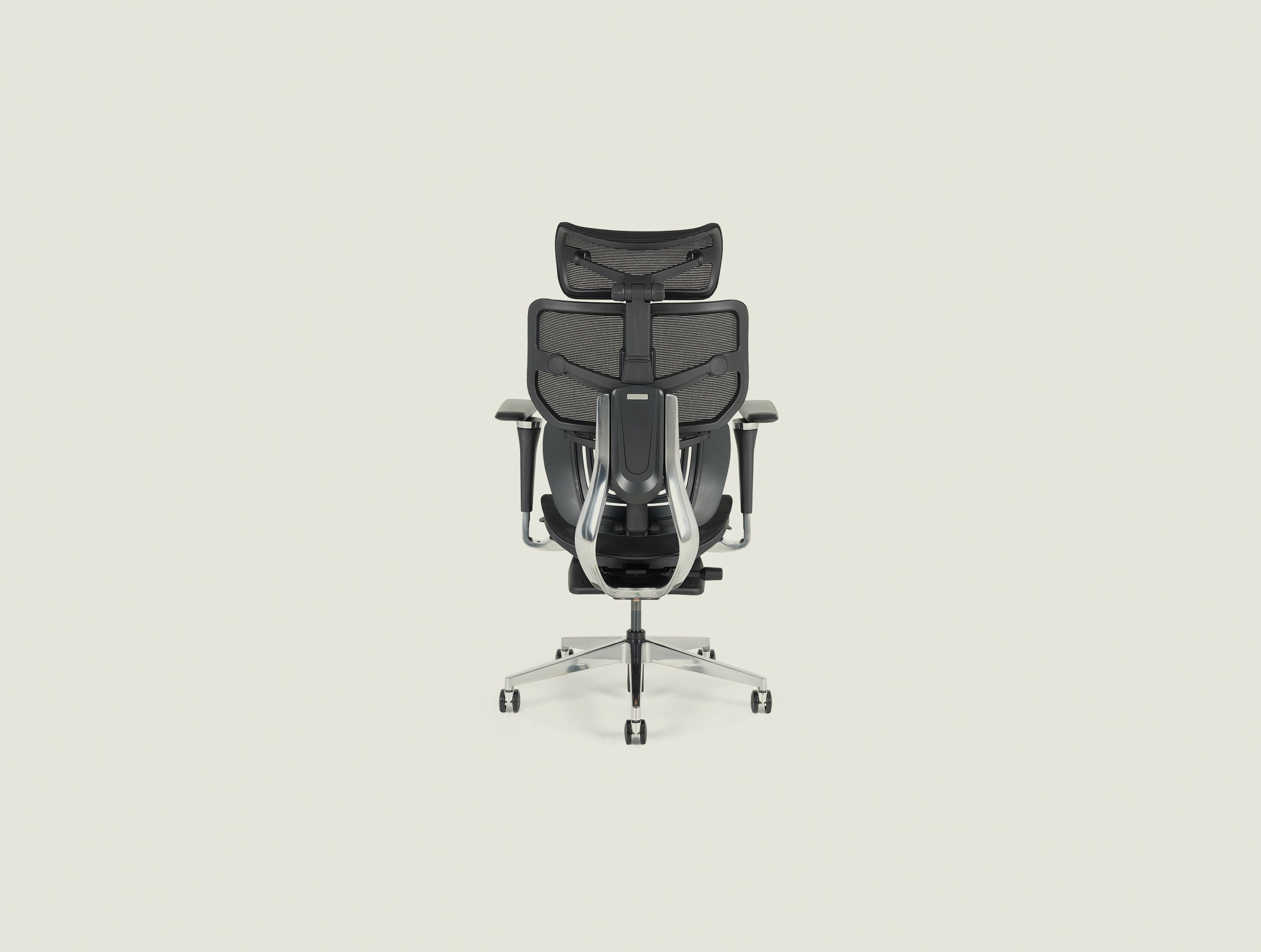 Shappa Spencer black ergonomic office chair back view showing adjustable lumbar support frame