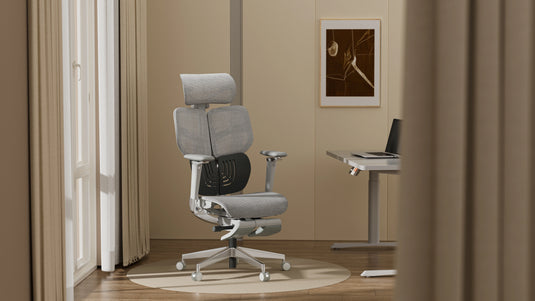 Shappa Spencer high back ergonomic office chair with headrest beside a standing desk in a home office
