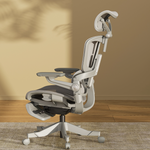 Smile foldable ergonomic chair in small apartment home office workspace setting - space-saving design