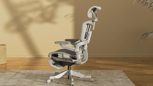Smile foldable ergonomic chair in small apartment home office workspace setting - space-saving design