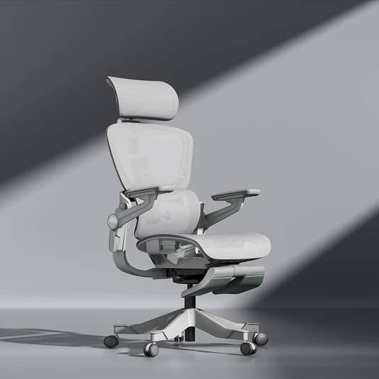Smile foldable ergonomic chair in small apartment home office workspace setting - space-saving design