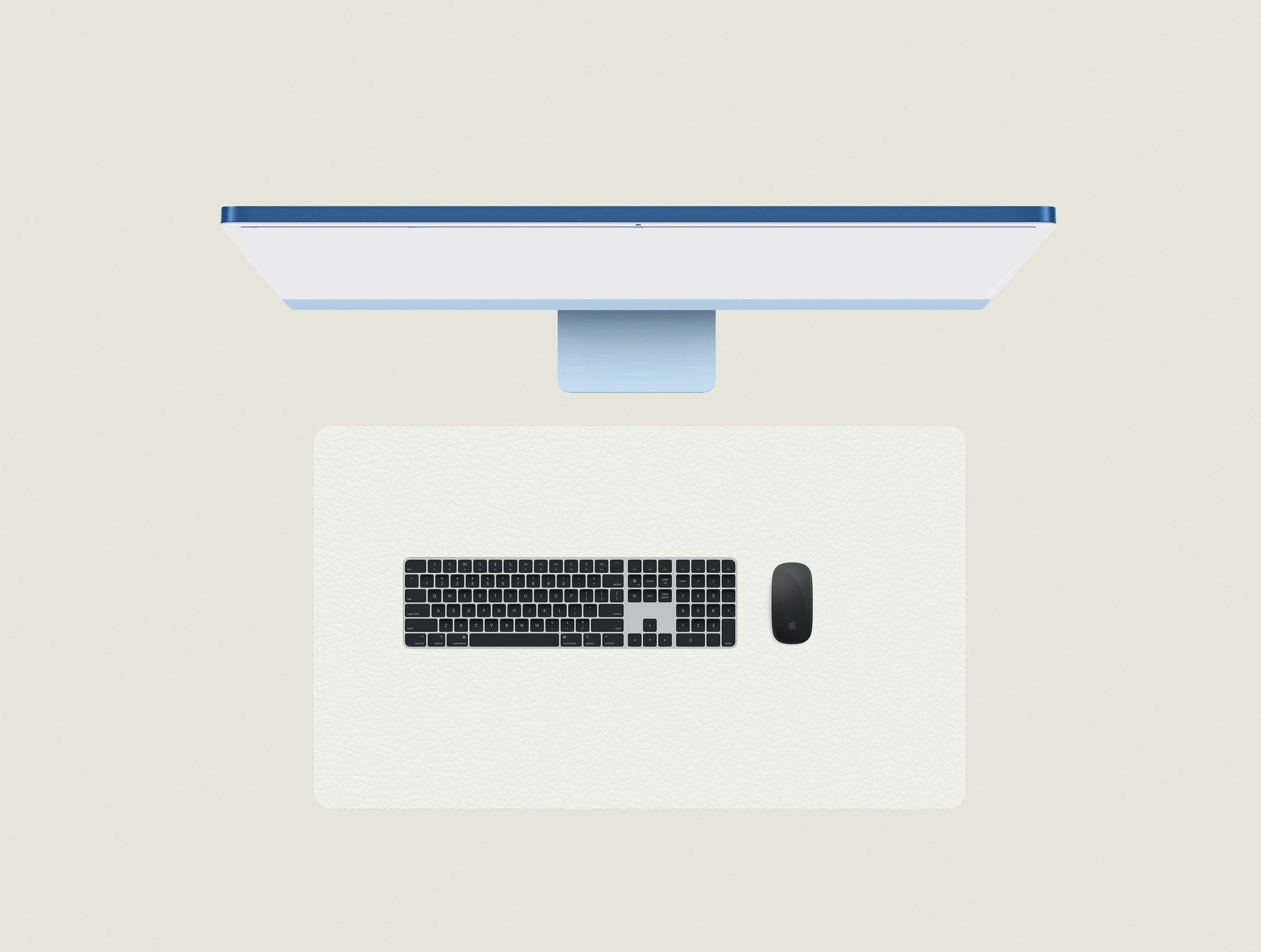 Moon White leather keyboard mat with a keyboard and mouse placed on top
