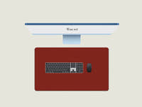 Wine Red leather mouse pad with a keyboard and mouse placed on top