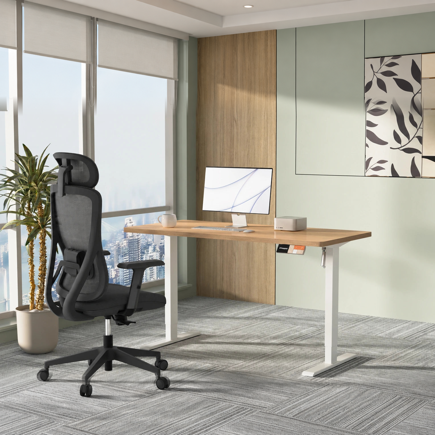 Shappa MS1 electric standing desk with oak tabletop and white frame, paired with a Shappa A7 ergonomic office chair in a high-rise office