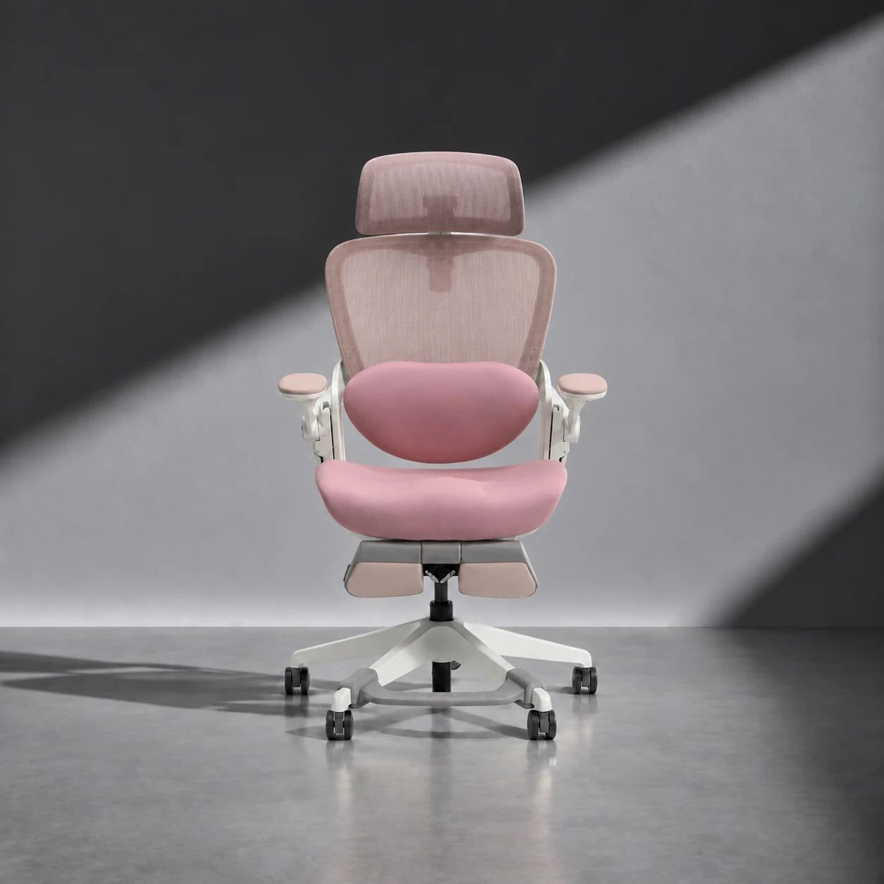 P1 Lady Ergonomic Chair in Blush Rose, diagonal-lit studio view