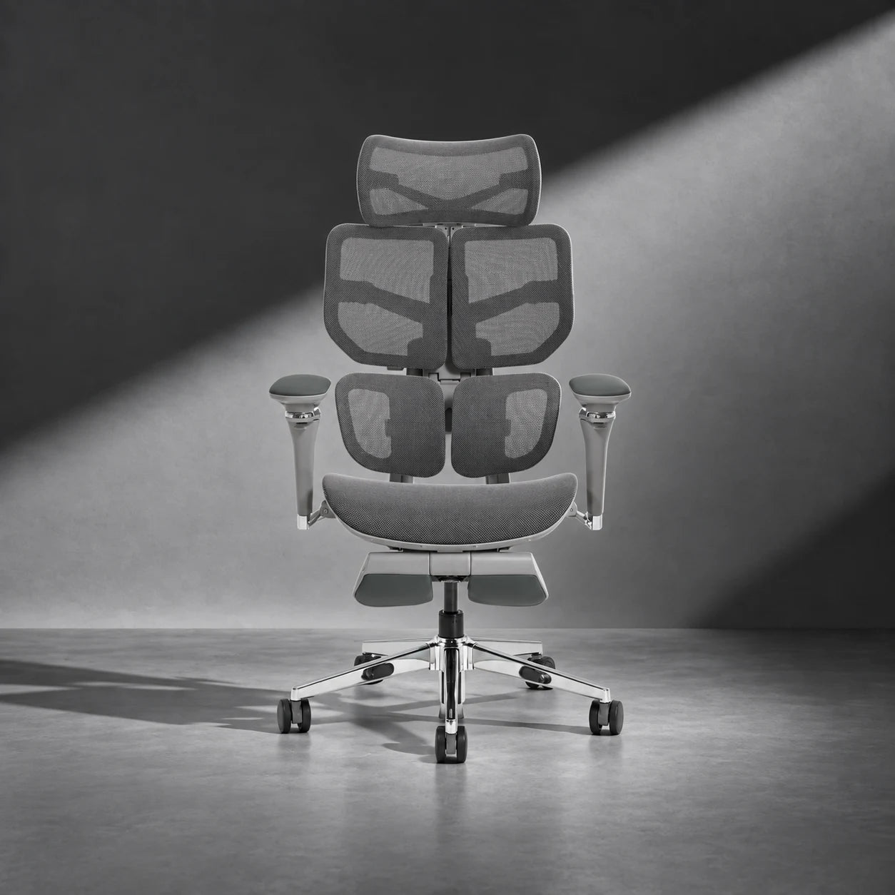 Spencer Air Ergonomic Chair in Grey, diagonal-lit studio view